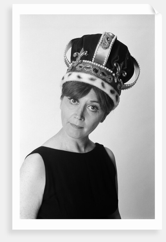1970s portrait woman wearing queen's crown looking at camera by Anonymous
