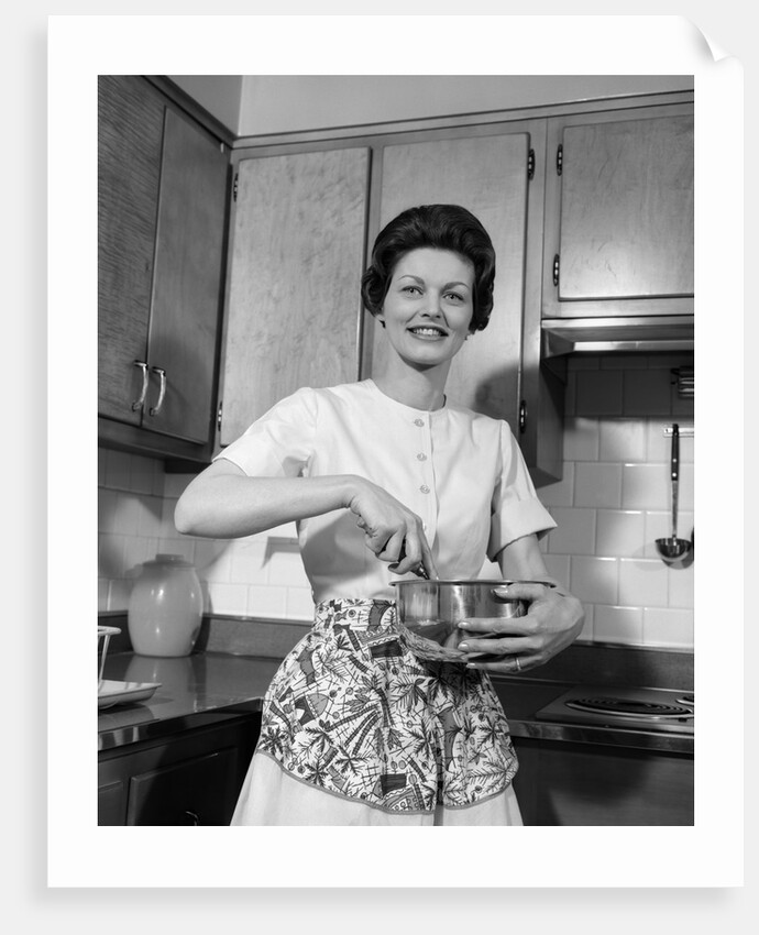 1960s woman kitchen housewife stir by Anonymous