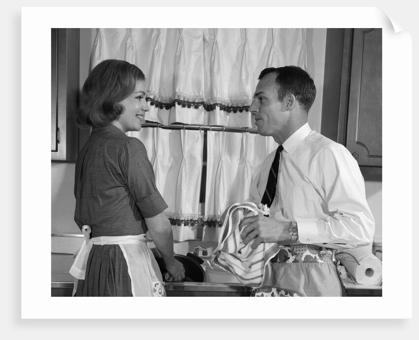 1960s man woman washing dishes kitchen sink by Anonymous