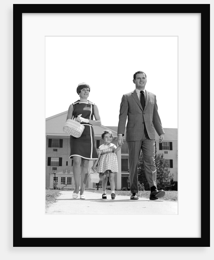 1960s 1970s family taking a walk sidewalk by Anonymous
