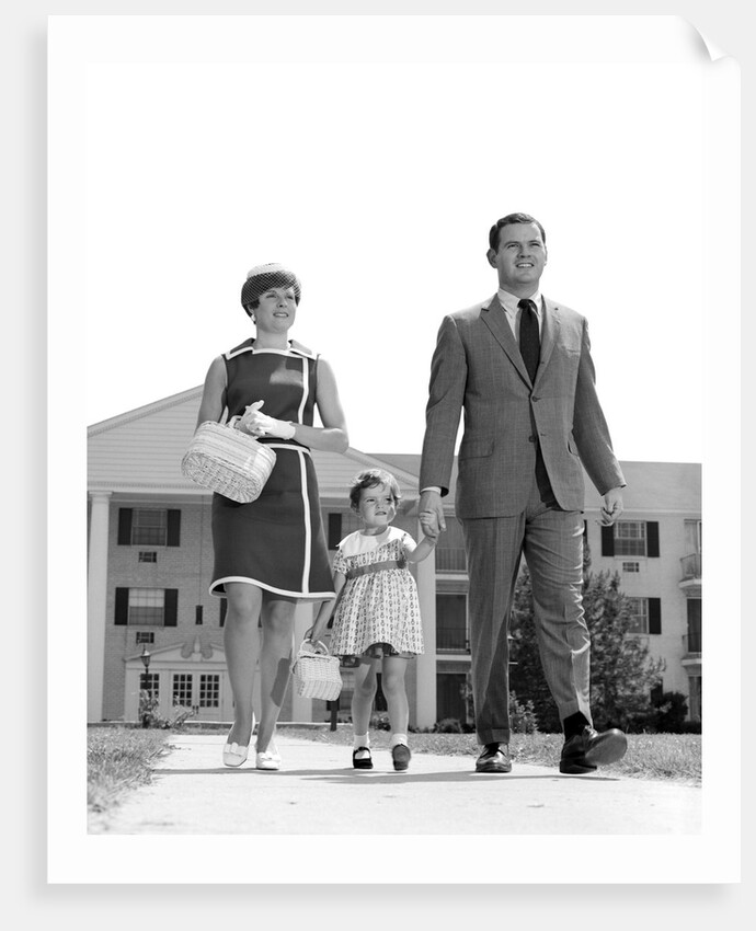1960s 1970s family taking a walk sidewalk by Anonymous