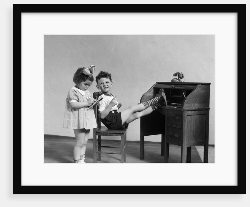 1930s two children boy and girl playing office boss feet on desk secretary taking dictation by Anonymous
