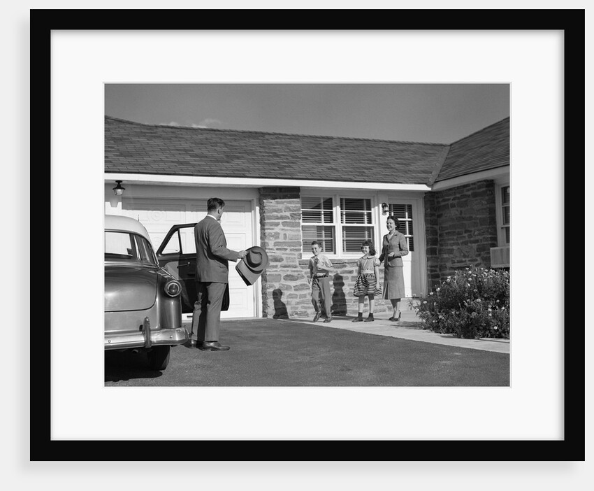 1950s family greeting father in driveway by Anonymous