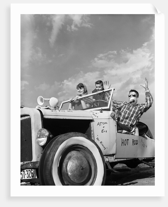 1950s teens in roofless hotrod with graffiti atom & eve no kissing etc. by Anonymous