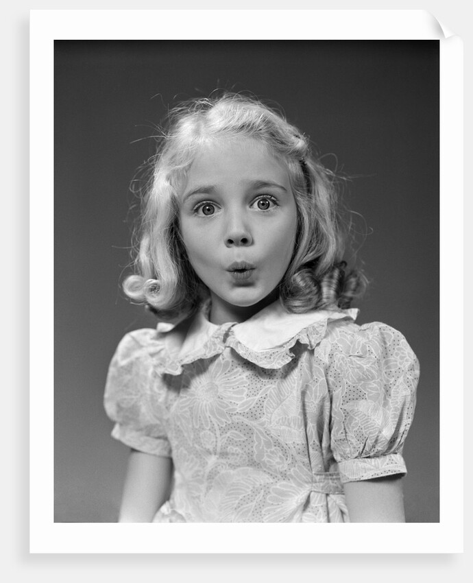 1940s 1950s blond girl whistling lips puckered eyes wide open looking at camera by Anonymous