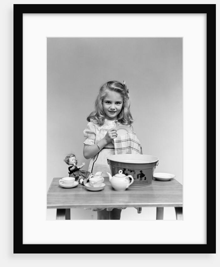 1940s child little girl and doll drying washing toy dishes by Anonymous