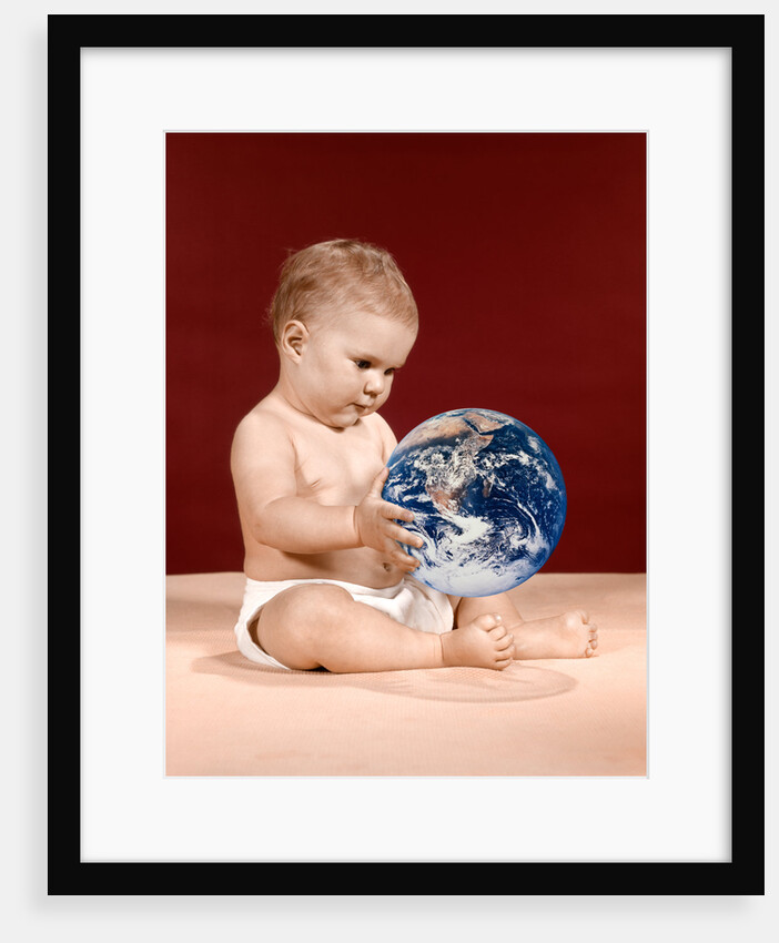 1960s symbolic ecology serious baby wearing cloth diapers sitting holding looking at the earth by Anonymous