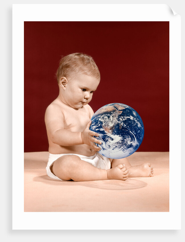 1960s symbolic ecology serious baby wearing cloth diapers sitting holding looking at the earth by Anonymous