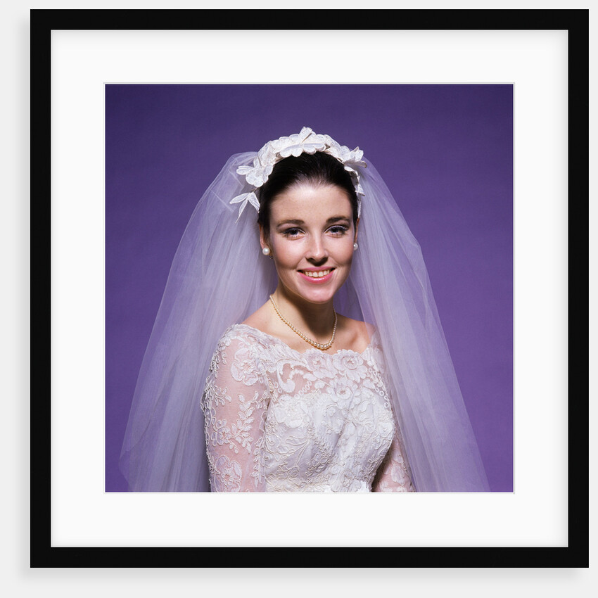 1960s young woman bride portrait bridal veil head shoulders smiling pearls by Anonymous