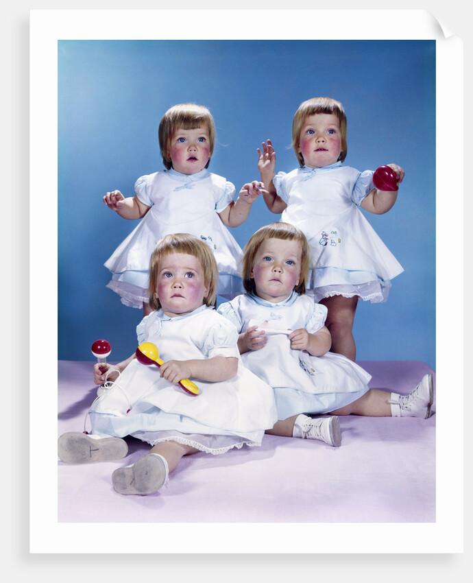 1950s 1960s quadruplet portrait 4 red haired girls wearing dresses two seated 2 standing by Anonymous