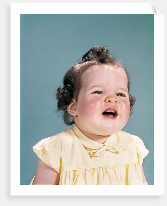 1960s smiling baby open mouth showing two new teeth gums teething by Anonymous