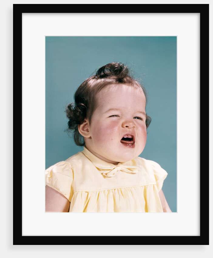 1950s 1960s unhappy crying baby mouth open showing new teeth teething pain by Anonymous