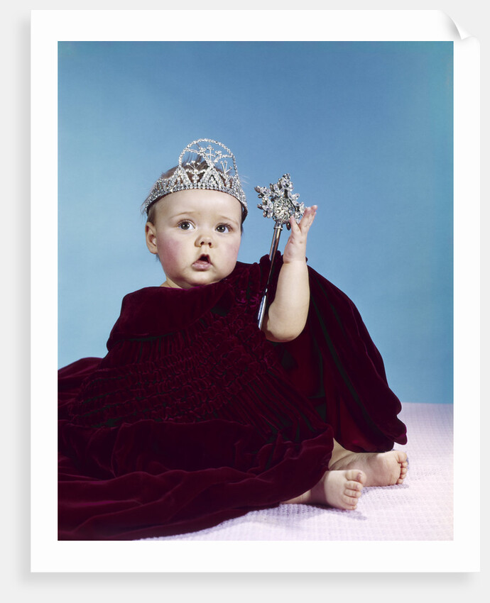 1960s baby dressed as royal queen in a velvet robe cloak cape rhinestone tiara crown and scepter wand by Anonymous
