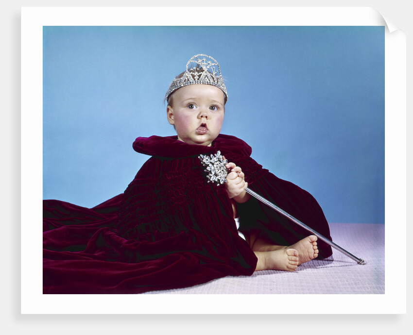 1960s baby dressed as royal queen in red velvet robe cloak cape rhinestone tiara crown and scepter wand by Anonymous