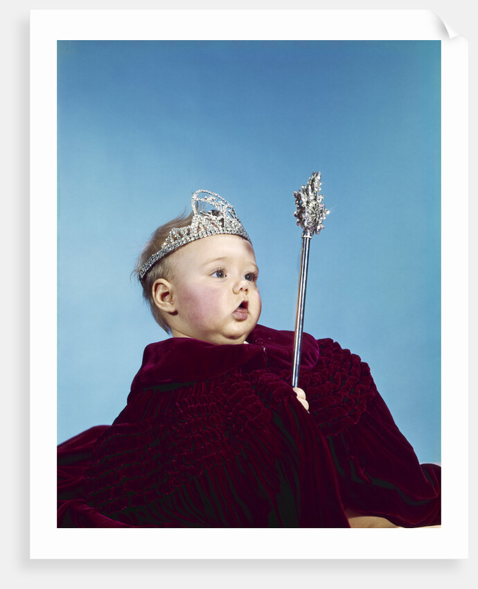 1960s baby dressed as royal queen in a velvet robe cloak cape rhinestone tiara crown and scepter wand by Anonymous