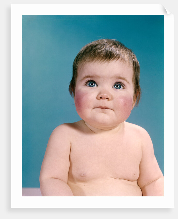 1960s portrait sweet brunette baby blue eyes looking up by Anonymous