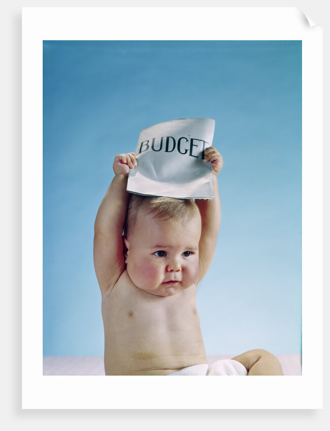 1960s baby holding budget sign above his head by Anonymous