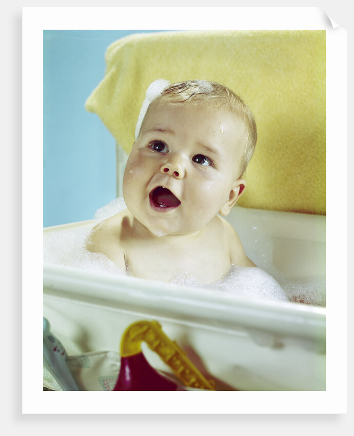 1960s happy baby taking bath by Anonymous