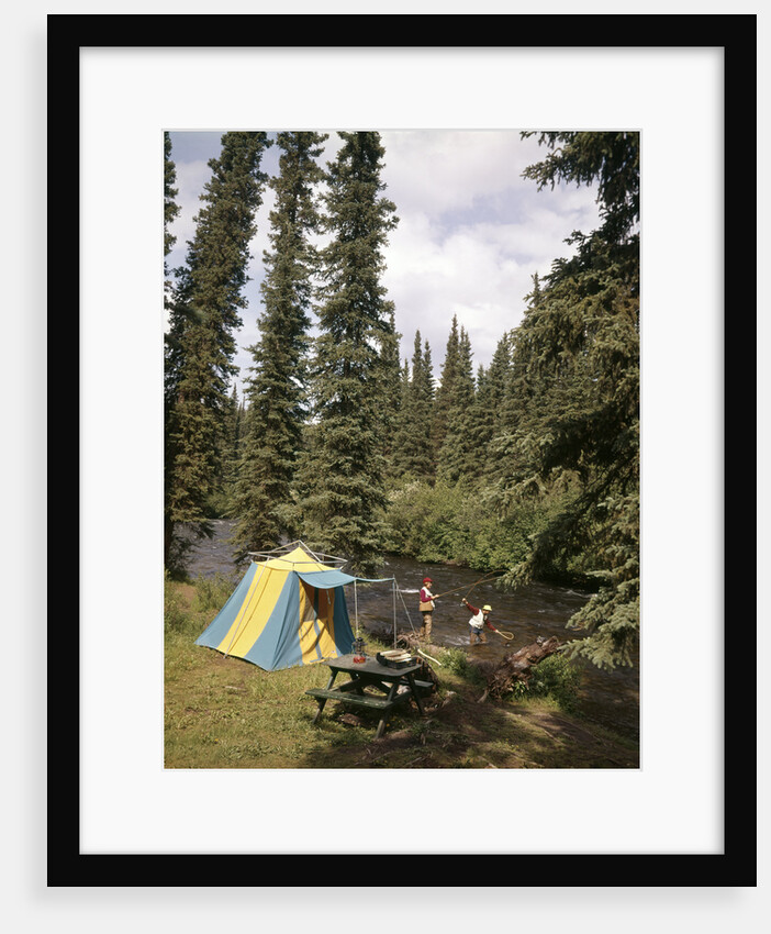 1970s couple man woman fishing in stream campsite with tent by Anonymous