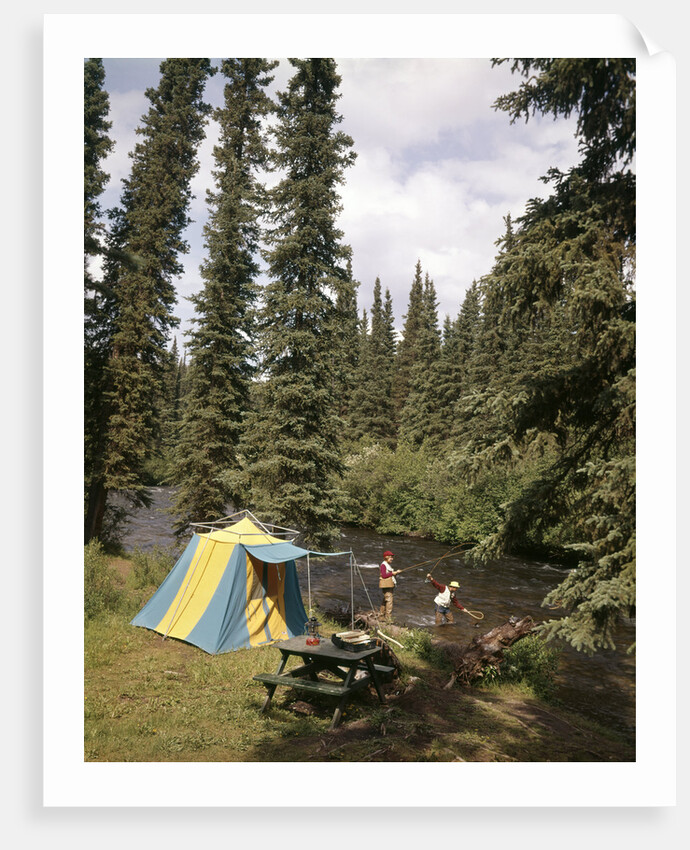 1970s couple man woman fishing in stream campsite with tent by Anonymous