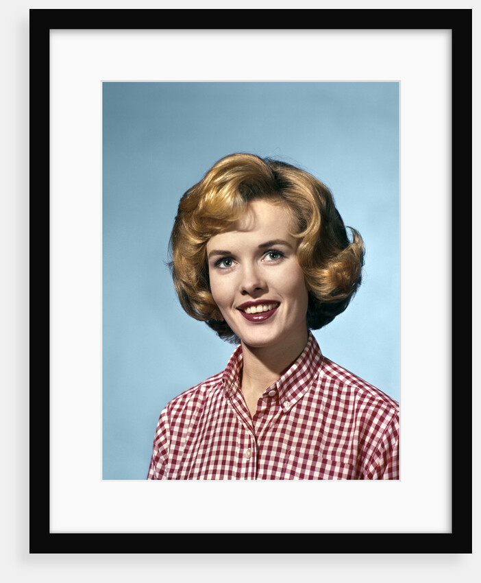 1960s portrait smiling blond woman wearing a red white checked blouse by Anonymous