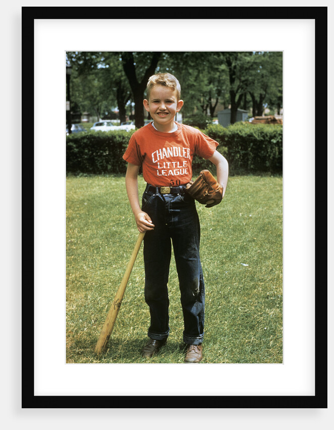 1950s 1958 little boy outside with baseball bat and glove looking at camera by Anonymous