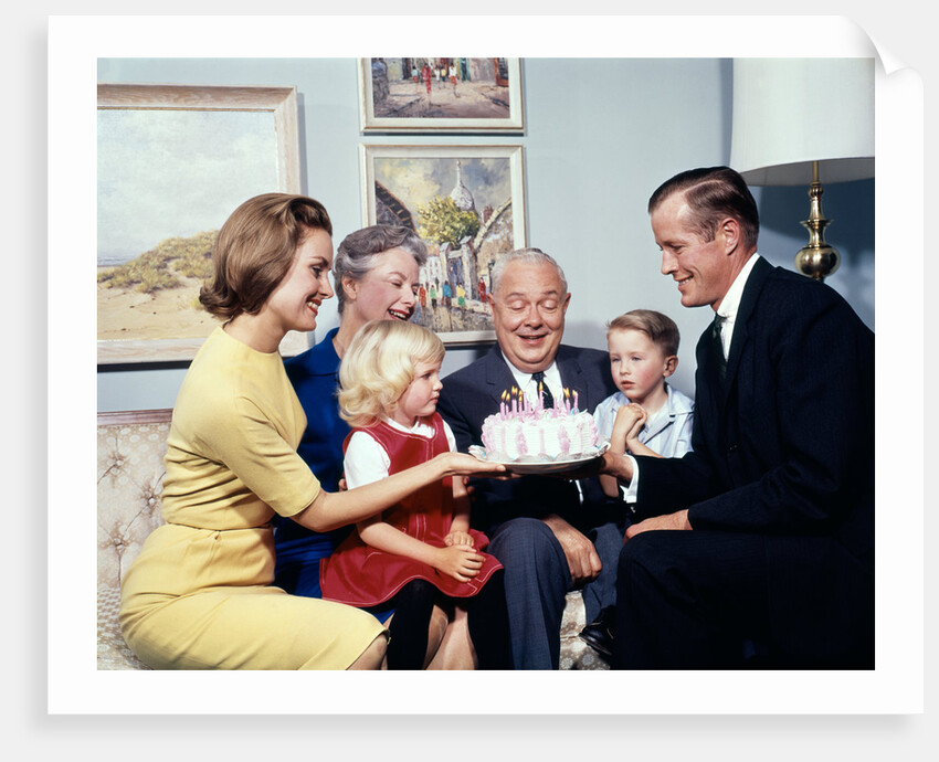 1960s three generation family with birthday cake by Anonymous