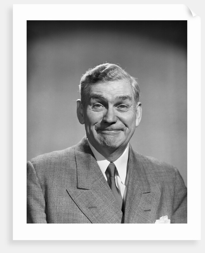 1950s mature middle aged man smiling business suit tie happy amused funny face expression by Anonymous