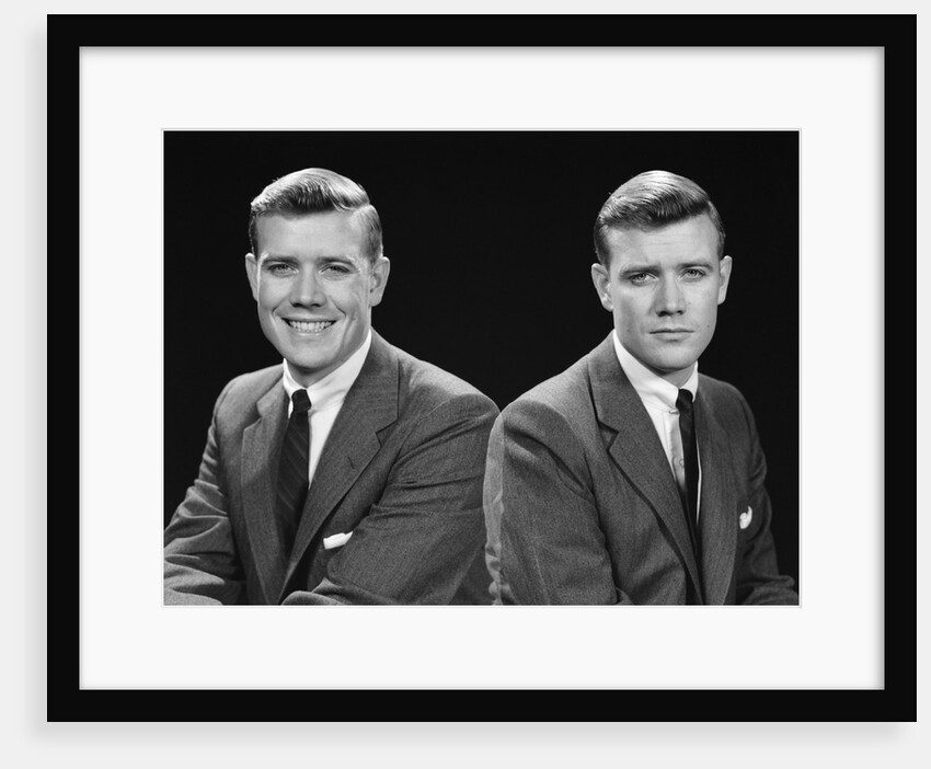 1950s double exposure of man with a smile and a frown wearing a suit by Anonymous