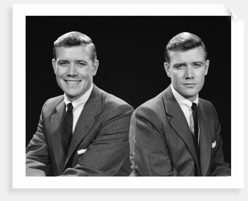 1950s double exposure of man with a smile and a frown wearing a suit by Anonymous