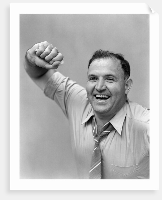 1940s 1950s portrait of man in shirt and tie holding handkerchief smiling by Anonymous