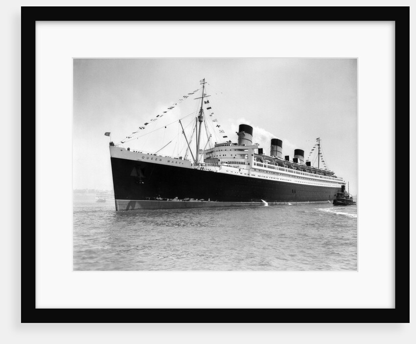 1930s 1936 maiden voyage of queen mary dwarfing small tugboat moving alongside it by Anonymous
