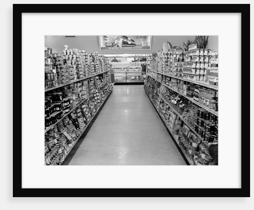 1950s grocery store aisle with canned goods on shelves to either side by Anonymous