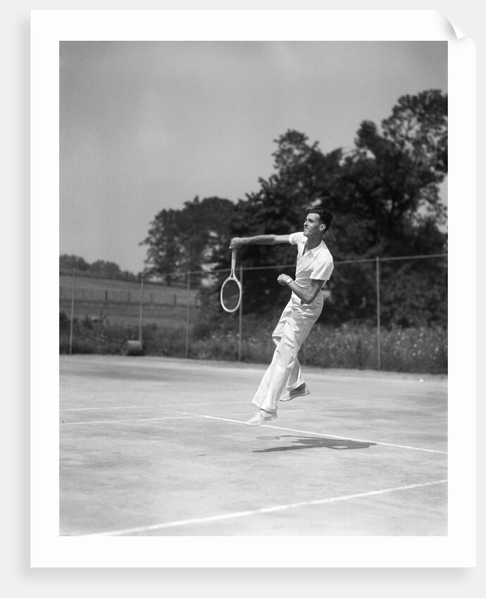 1930s man playing tennis jumping mid air action by Anonymous