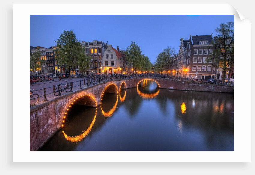 Evening light old buildings and bridge along the many Canals of Amsterdam, Netherlands by Anonymous