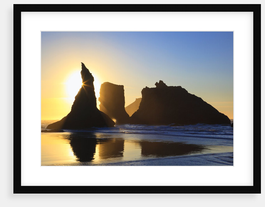 sunset over rock formations along Bandon Beach at lowtide, Oregon Coast by Anonymous