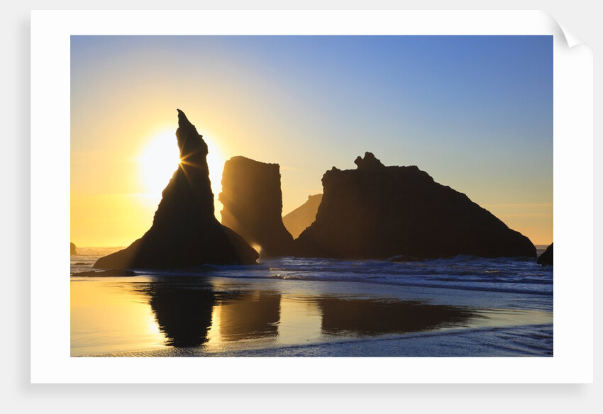 sunset over rock formations along Bandon Beach at lowtide, Oregon Coast by Anonymous