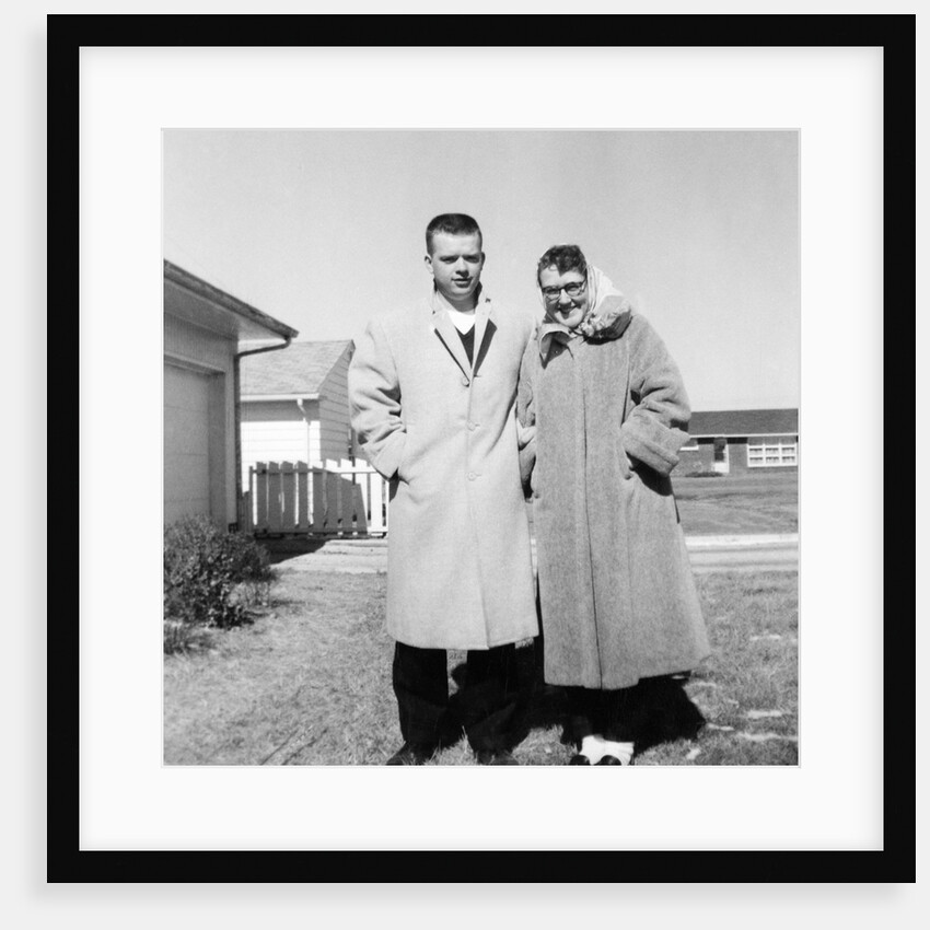 Young married couple pose in their Illinois yard, ca. 1956. by Anonymous