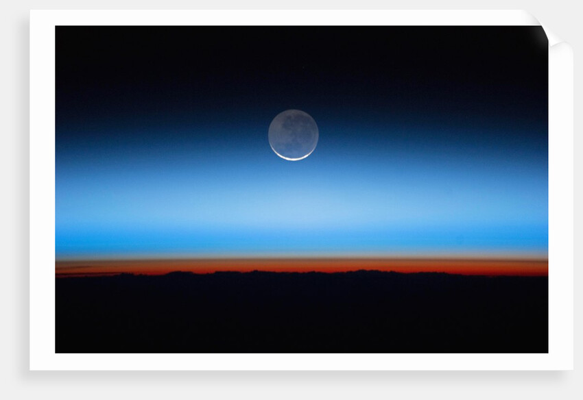 Crescent moon photographed from orbit aboard the International Space Station by Anonymous