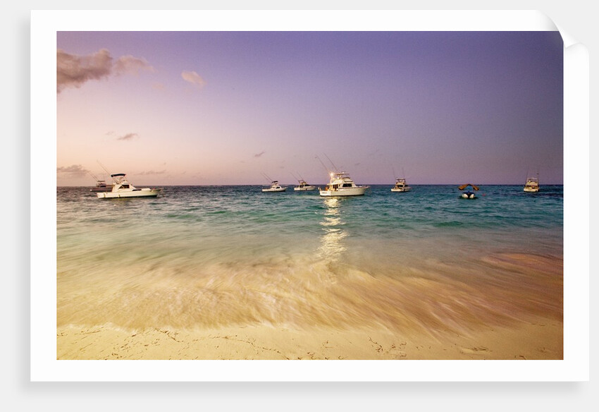 Beach and fishing boats on sea, Bavaro, Dominican Republic by Anonymous