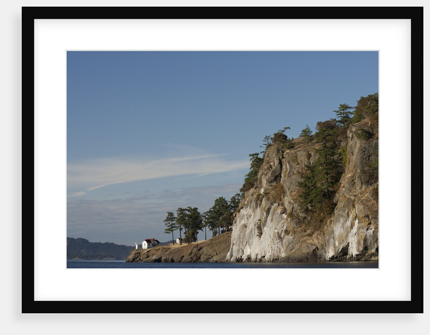 North America, United States, Washington, lighthouse and cliff in San Juan Islands, by Anonymous