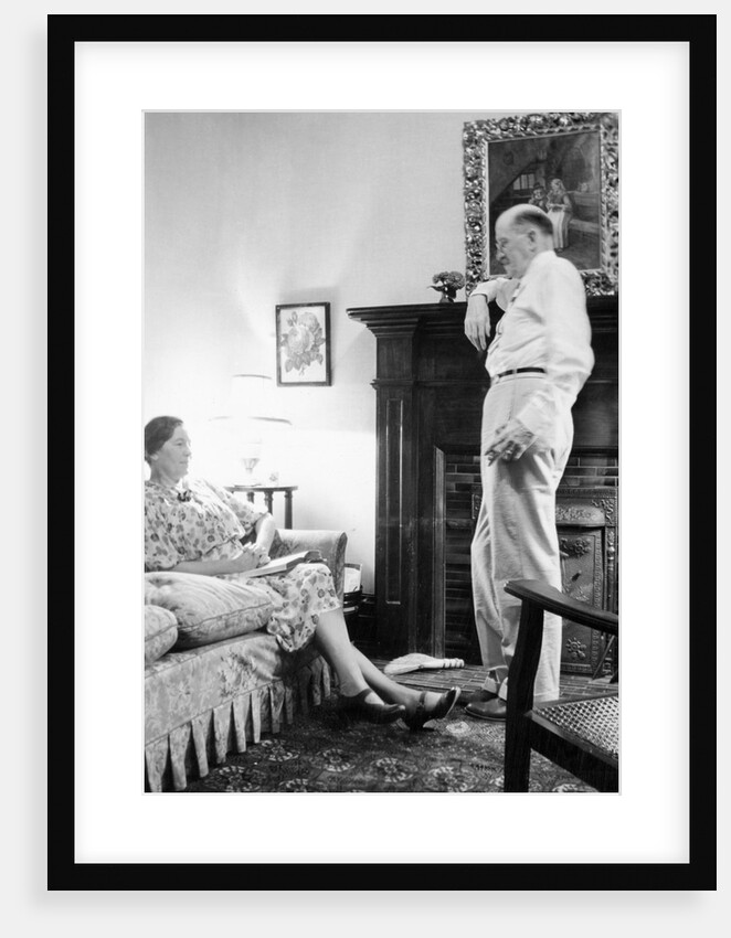 Senior man and woman in the living room, ca. 1935 by Anonymous
