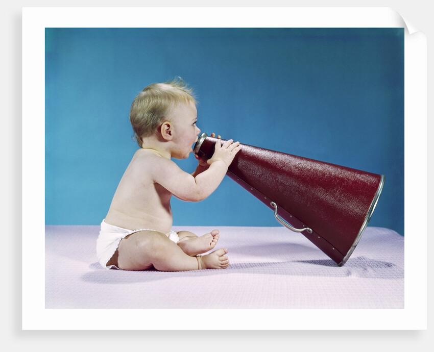 1960s Profile Of Seated Baby Shouting Yelling Speaking Into Big Megaphone by Anonymous