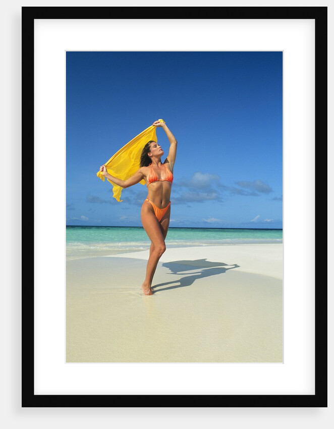 1980s 1990s Woman On Beach Wearing Orange Bikini Holding Yellow Cloth Mopion Island West Indies by Anonymous