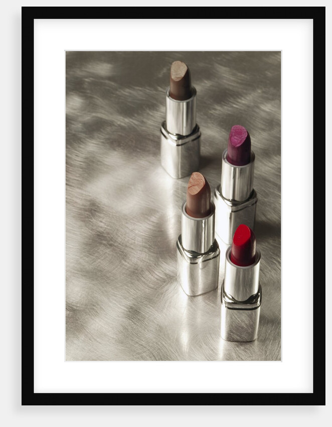 4 Lipsticks Different Colors by Anonymous