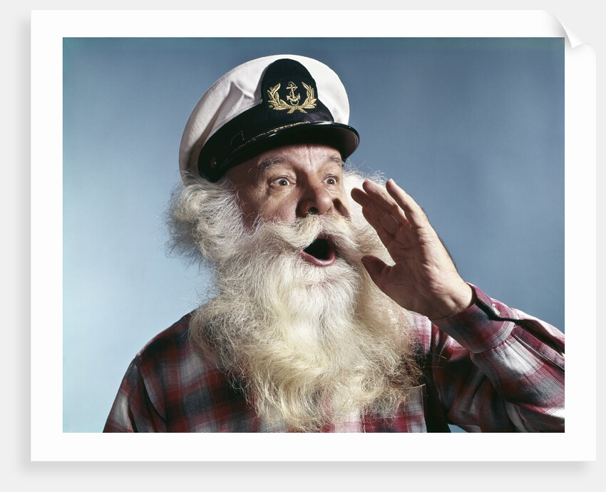 1960s Senior Man Full White Beard Wear Ship Captains Hat Shouting With Hand Cupped To Mouth by Anonymous