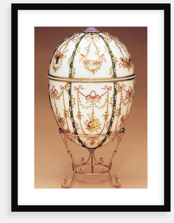 Faberge Kelch Bonbonniere egg shown in a gold egg-stand of scroll design by Anonymous