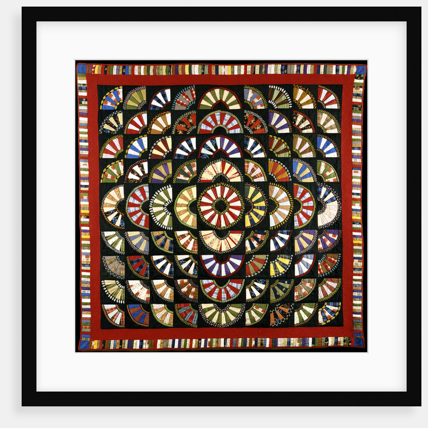 A pieced cotton quilted coverlet by Anonymous