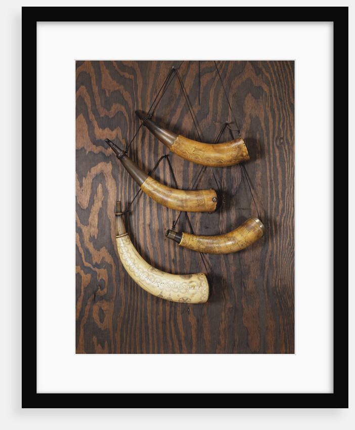 A collection of engraved powder horns by Anonymous