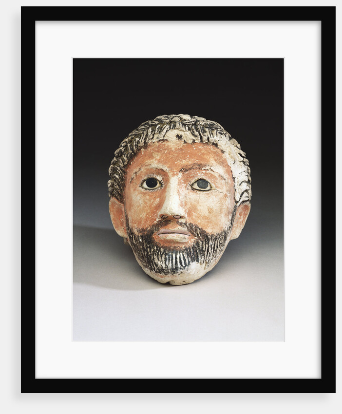 An Egyptian mummy mask of a man by Anonymous